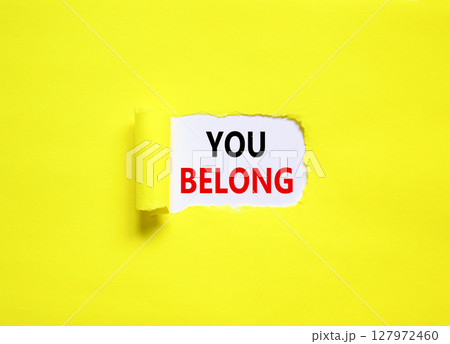 Belonging and you belong symbol. Concept words You belong on beautiful white paper. Beautiful yellow paper background. Business belonging and you belong concept. Copy space. 127972460