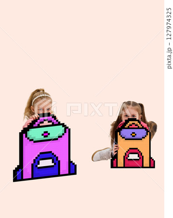 Playful surreal concept. Two girls with giant cartoon backpacks on pastel background 127974325