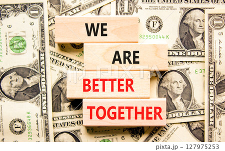 We are better together symbol. Concept words phrase We are better together on beautiful blocks. Dollar bills. Beautiful dollar bills background. Business We are better together concept. Copy space We are better together symbol. Concept words phrase We are better together on beautiful blocks. Dollar bills. Beautiful dollar bills background. Business We are better together concept. Copy space 127975253