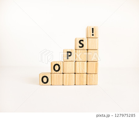 Oops symbol. Concept word Oops on beautiful wooden blocks. Beautiful white table white background. Business lifestyle oops concept. Copy space. Oops symbol. Concept word Oops on beautiful wooden blocks. Beautiful white table white background. Business lifestyle oops concept. Copy space. 127975285