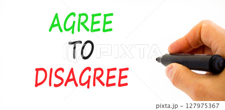 Agree to disagree symbol. Concept words Agree to disagree on beautiful white paper. Beautiful white background. Businessman hand with pen. Business and agree to disagree concept. Copy space. 127975367