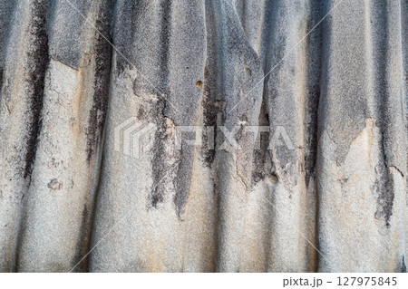 Closeup of granite rock texture shaped by erosion on La Digue island, Seychelles 127975845