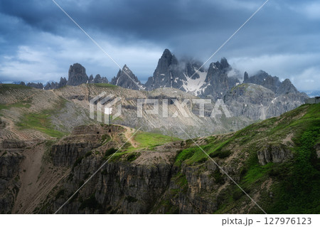 Impressive view of the Italian Dolomites reveals dramatic clouds 127976123