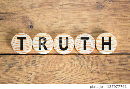 Truth symbol. Concept word Truth on beautiful wooden circles. Beautiful wooden table wooden background. Business lifestyle truth concept. Copy space. Truth symbol. Concept word Truth on beautiful wooden circles. Beautiful wooden table wooden background. Business lifestyle truth concept. Copy space. 127977761