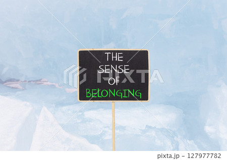 The sense of belonging symbol. Concept words The sense of belonging on beautiful black blackboard. Beautiful blue ice background. Business and the sense of belonging concept. Copy space. The sense of belonging symbol. Concept words The sense of belonging on beautiful black blackboard. Beautiful blue ice background. Business and the sense of belonging concept. Copy space. 127977782