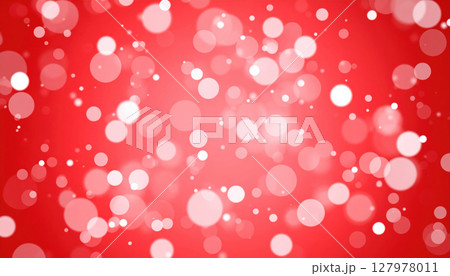 Bright red background with white bokeh lights creating festive atmosphere 127978011