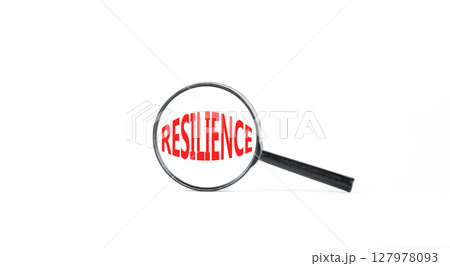 Resilience symbol. Concept word Resilience in beautiful magnifying glass. Beautiful white paper background. Business resilience concept. Copy space. Resilience symbol. Concept word Resilience in beautiful magnifying glass. Beautiful white paper background. Business resilience concept. Copy space. 127978093