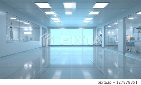 Clean, well-lit medical facility hallway with reflective tiled floor. Glass-walled rooms on either side, bright interior and empty center space showcase modern design. 127978851