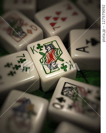 playing cards on a wooden table 127979092
