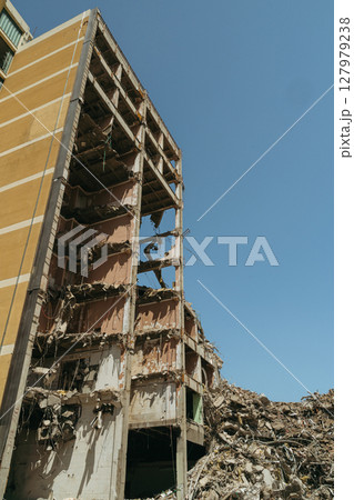 Ruins of a collapsed residential building Ruins of a collapsed residential building 127979238