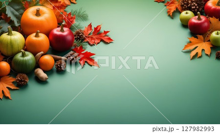 There is a wide variety of fruits and vegetables spread out across the table 127982993