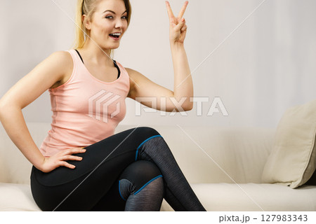 Portrait of happy blonde woman smiling with joy 127983343