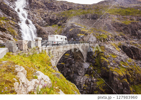 Camper car in norwegian mountains 127983960