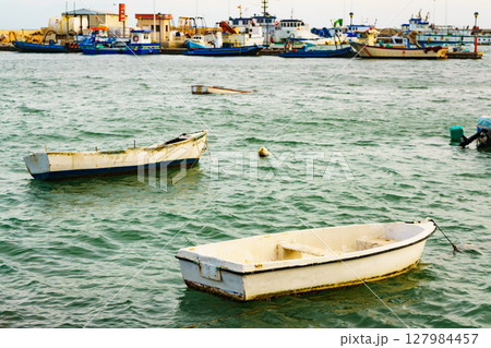 Boat on water surface 127984457