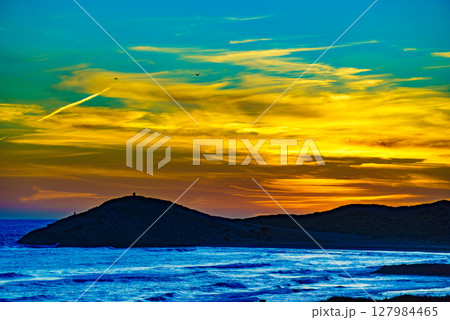 Sunset over sea, Calblanque beach, Spain Sunset over sea, Calblanque beach, Spain 127984465