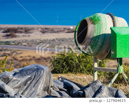 Cement mixer at construction site Cement mixer at construction site 127984615
