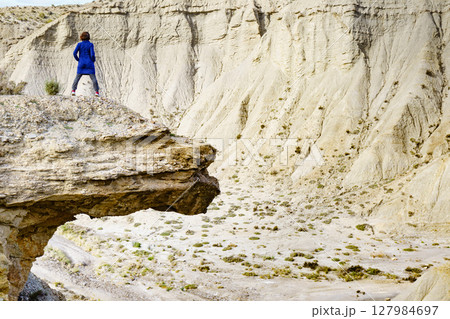 Tourist on Tabernas desert, Spain 127984697