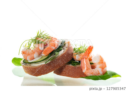 fitness sandwich with seafood on white background 127985347
