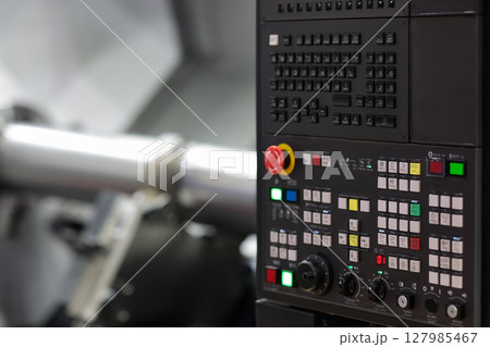 control panel of CNC turning machine close up 127985467