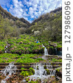 Small waterfall on the Georgian Military road. High quality photo 127986096
