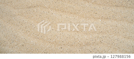 Sandy yellow waves, formations in a desert, textured nature background. Sandy yellow waves, formations in a desert, textured nature background. 127988156