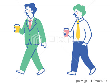 コーヒーを持ってビジネス街を歩く男性_色 127989283