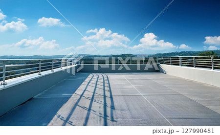 校舎の屋上　コンクリート　手すり　青空 127990481