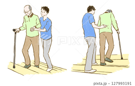 福祉・介護：階段をあがる杖をついたシニア男性をサポートする若い男性 127993191