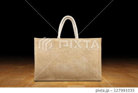 Big Shopping bags made from recycled sacks on a wooden background. 127993335