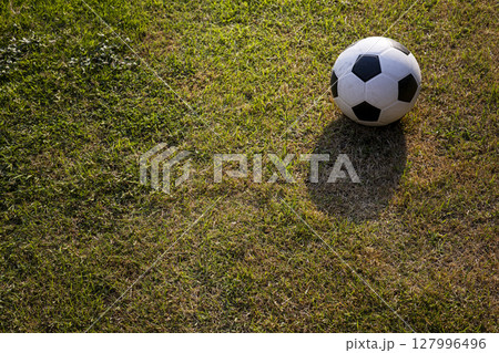 Football On The Grass, Background for advertising and wallpaper in nature and sports scenes. 127996496