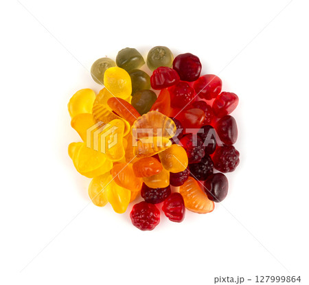 Fruit gummy candy pile isolated, vegan chewing marmalade pills, jelly gumdrops heap Fruit gummy candy pile isolated, vegan chewing marmalade pills, jelly gumdrops heap 127999864