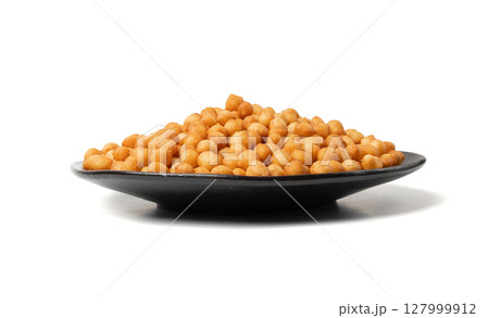 Small pastry balls, fried crispy wheat soup pearls, salad egg puffs or choux pastry Small pastry balls, fried crispy wheat soup pearls, salad egg puffs or choux pastry 127999912