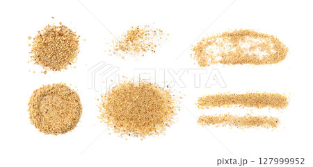 Grated wallnut , broken roasted walnuts, heap of nuts crumbs, whole kernel pieces, fractions 127999952