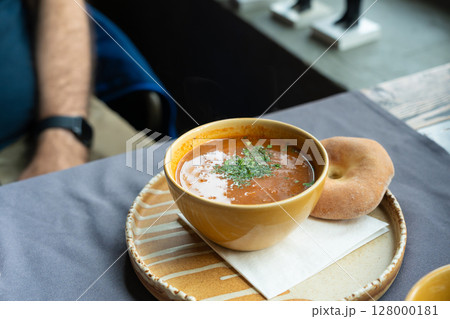 Spicy kharcho or harcho soup, traditional Georgian chowder. Creamy kharcho broth 128000181