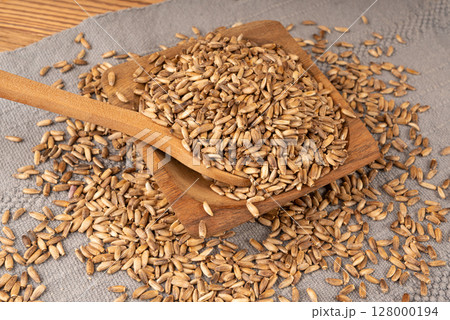 Milk thistle seeds, silybum marianum grains, dry blessed milkthistle fruits, variegated thistle kernels 128000194