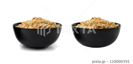 Dry parsley root, dried diced celery cubes, scattered small liquorice pileces, dry vegetable 128000391