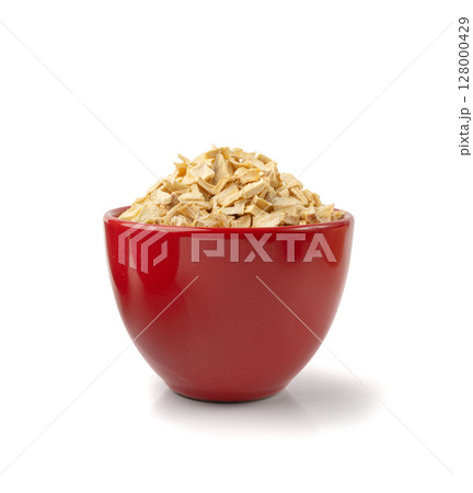 Dry parsley root, dried diced celery cubes, scattered small liquorice pileces, dry vegetable 128000429