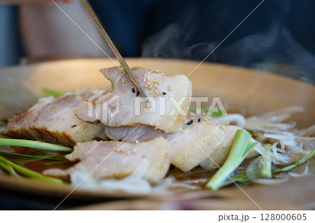 Close-Up of Steamed Korean Pork Belly (Bossam) with Rising Steam Close-Up of Steamed Korean Pork Belly (Bossam) with Rising Steam 128000605