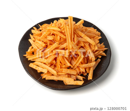 Fried chips sticks isolated, finger potato chips, golden shoestring fries pile, French fries 128000701