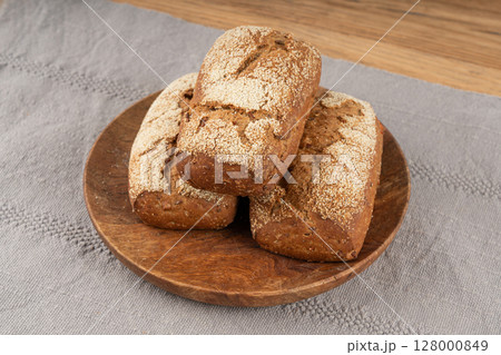 Whole wheat brown bread, fitness pumpkin carrot buns with seeds, cereal bread grain bun 128000849
