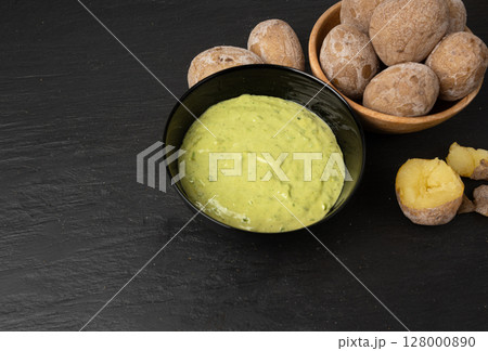 Red mojo rojo and green mojo verde sauces, traditional Tenerife dips, mojo picon dressing 128000890