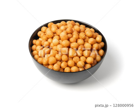 Small pastry balls, fried crispy wheat soup pearls, salad egg puffs or choux pastry Small pastry balls, fried crispy wheat soup pearls, salad egg puffs or choux pastry 128000956