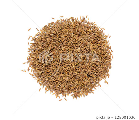 Cumin seed isolated. Caraway or fennel dry seeds close up, zeera macro, Indian cumin or zira grains Cumin seed isolated. Caraway or fennel dry seeds close up, zeera macro, Indian cumin or zira grains 128001036