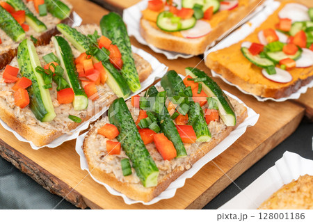 Polish traditional sandwiches with lard, bell pepper and fresh cucumbers Polish traditional sandwiches with lard, bell pepper and fresh cucumbers 128001186