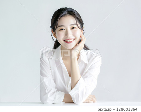 ほおづえをつく若い日本人女性　AI生成画像　 128001864