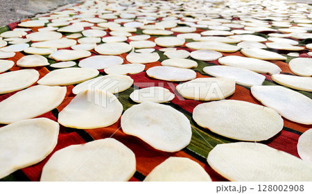 Homemade Sun Drying Potato Slices for Chips Homemade Sun Drying Potato Slices for Chips 128002908
