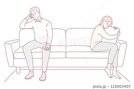 A couple is sitting on the couch, showcasing underlying tension and emotional distance between them A couple is sitting on the couch, showcasing underlying tension and emotional distance between them 128003407