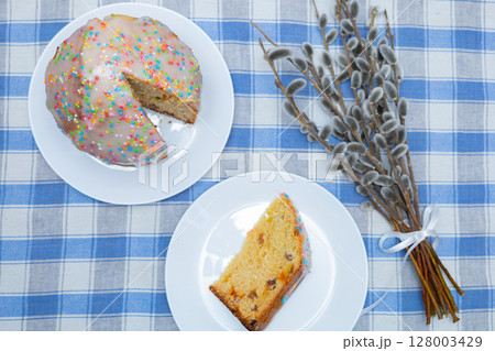 Delicious Easter cake on white background Delicious Easter cake on white background 128003429