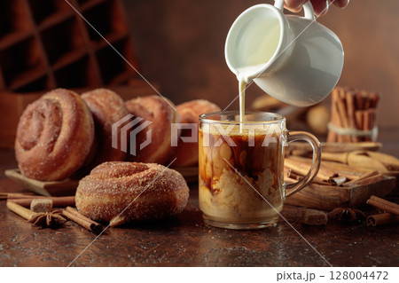 Swedish cinnamon rolls and coffee latte. Swedish cinnamon rolls and coffee latte. 128004472