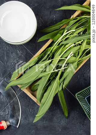 A bunch of wild onion or Ramps on the table. 128004649